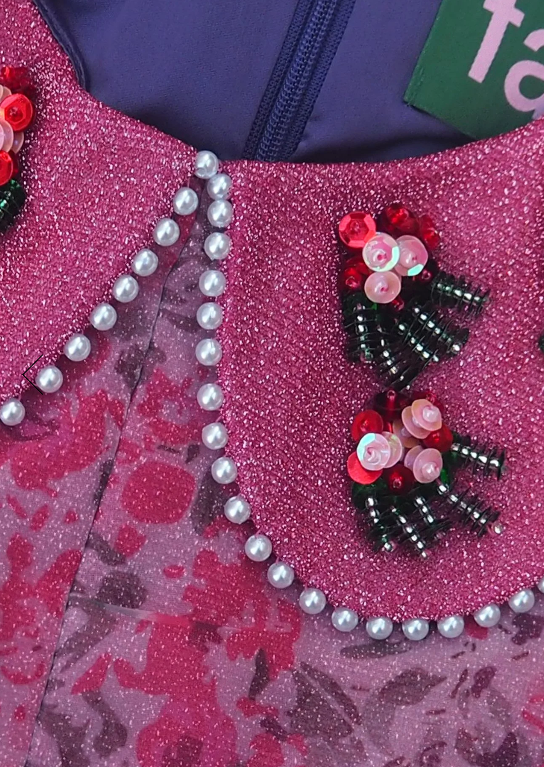 "Close-up of hand-sewn jewelled collar detail on the Pink Pixie dress — FAM IRVOLL"